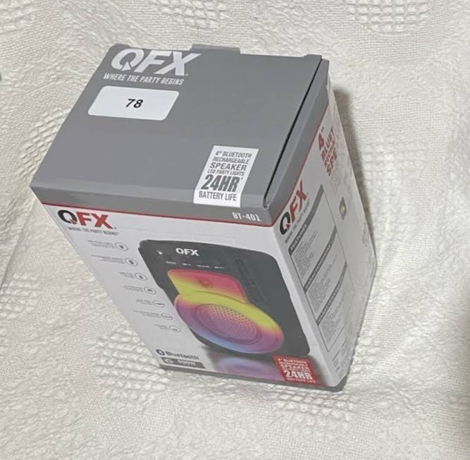 QFX BT-401 speaker box top angle view showing 24HR battery life label