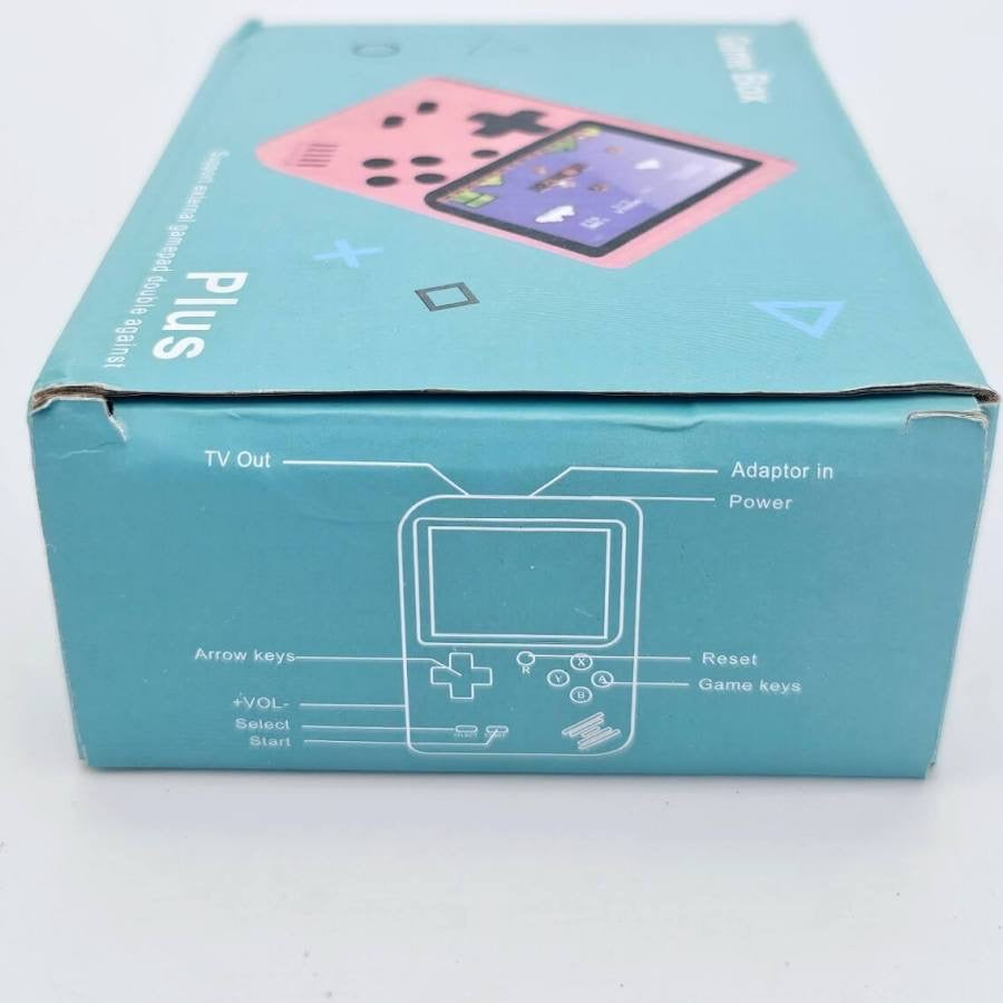 Game Box Plus box bottom showing button layout diagram: TV out, power, arrow keys, volume, select, start, reset, game keys